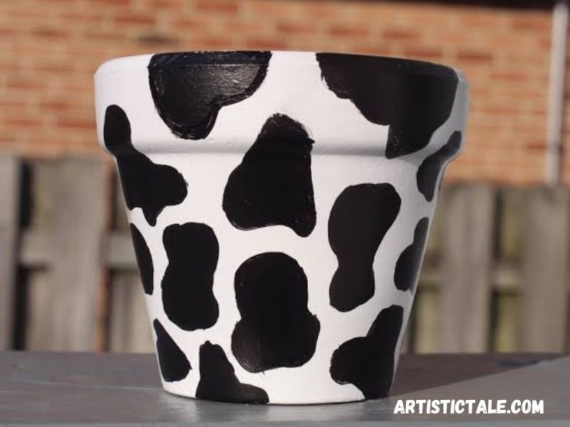 Cow print pot painting