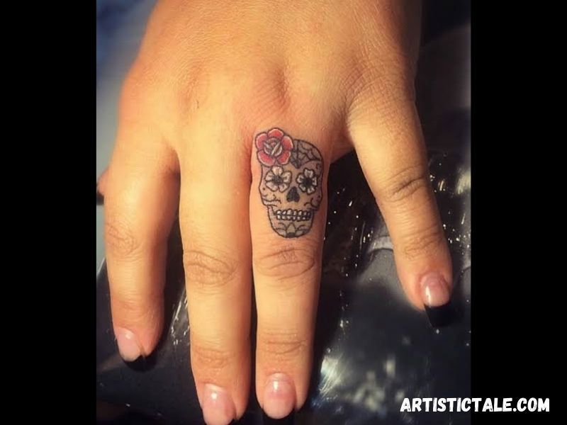 Sugar Skull Finger Tattoo